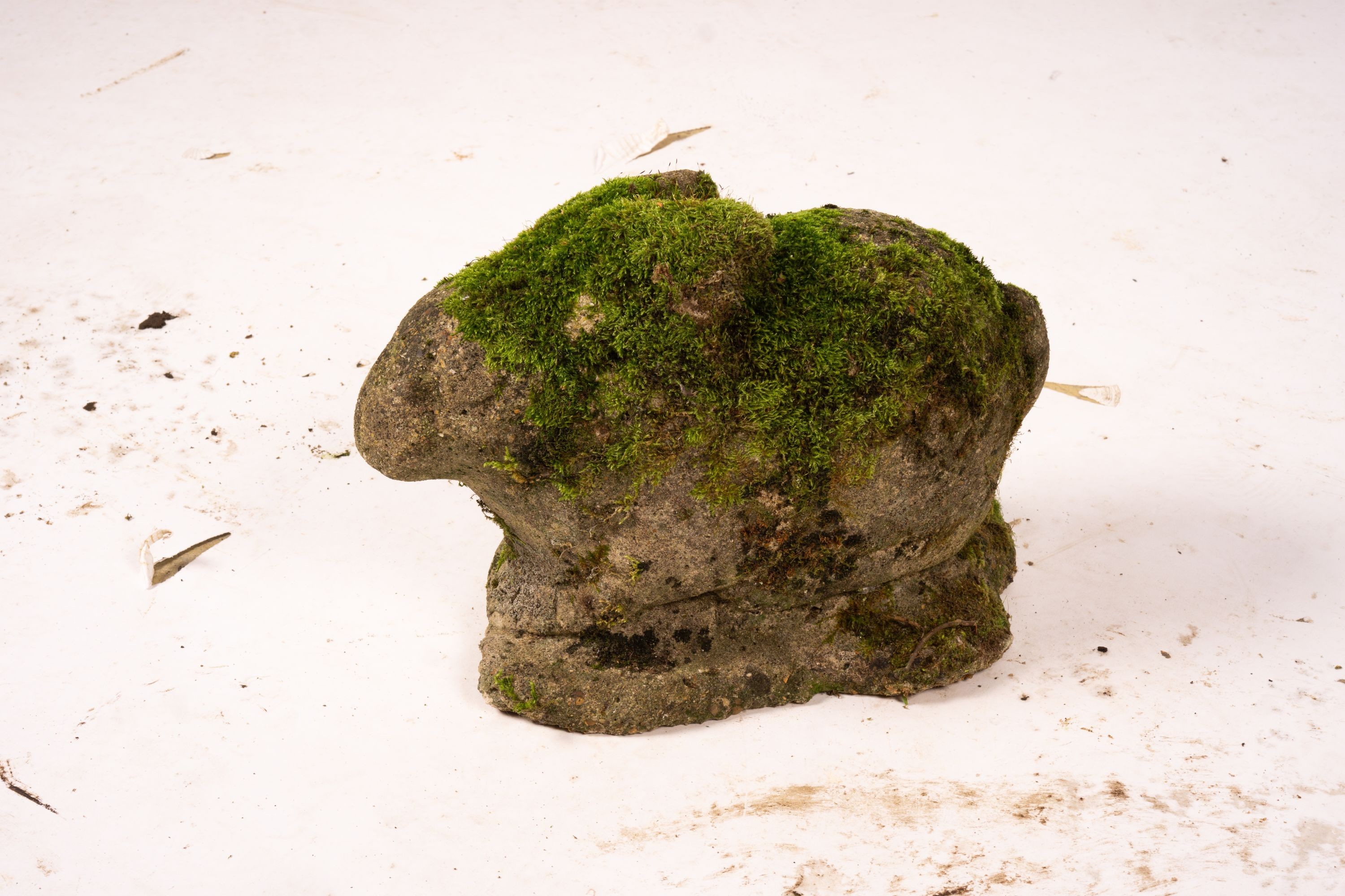 Three reconstituted stone garden ornaments, squirrels and rabbit, tallest 34cm